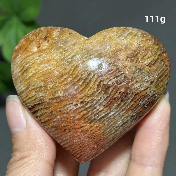 111g Natural Garden Thousand-Layer crystal heart ornament with golden layered patterns for healing and Feng Shui decor.