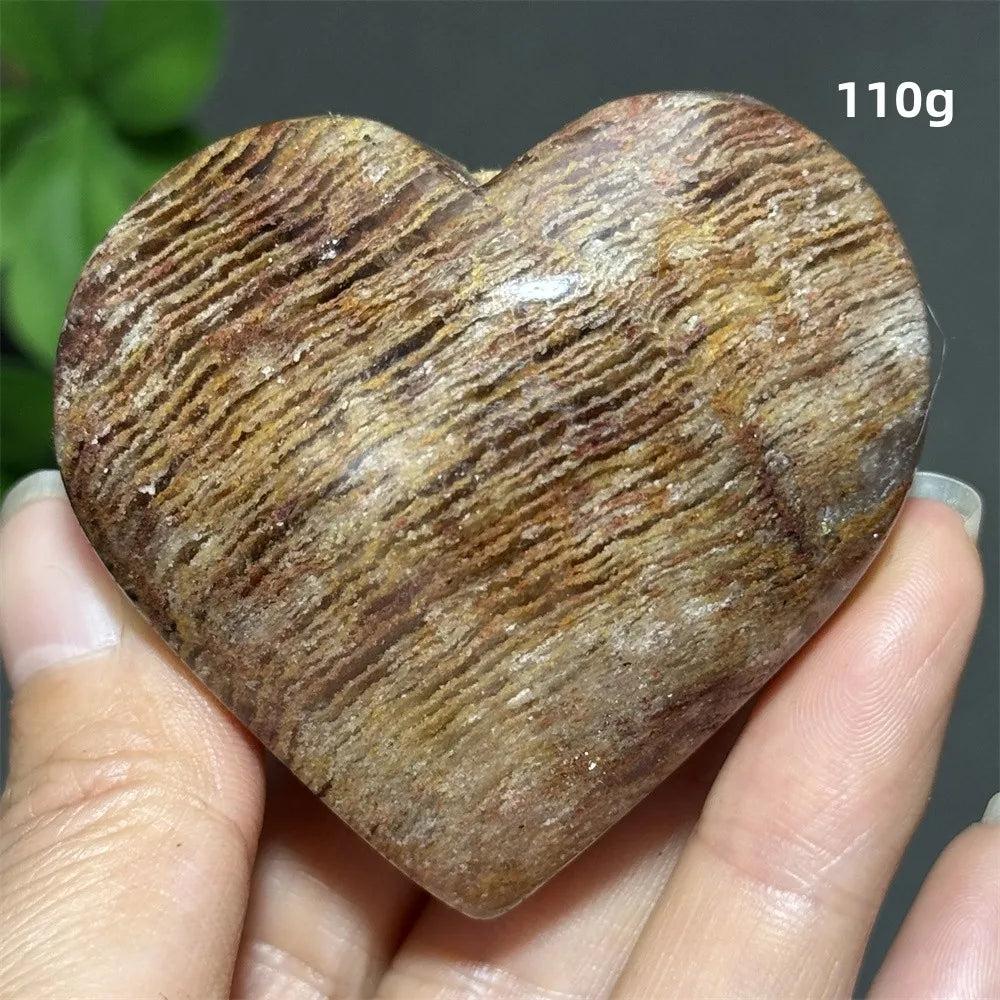 110g Natural Garden Thousand-Layer crystal heart for Feng Shui, featuring earthy banded patterns for healing and meditation.