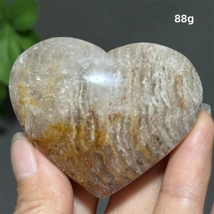 88g Natural Garden Thousand-Layer crystal heart for Feng Shui, featuring unique earthy inclusions for healing energy.