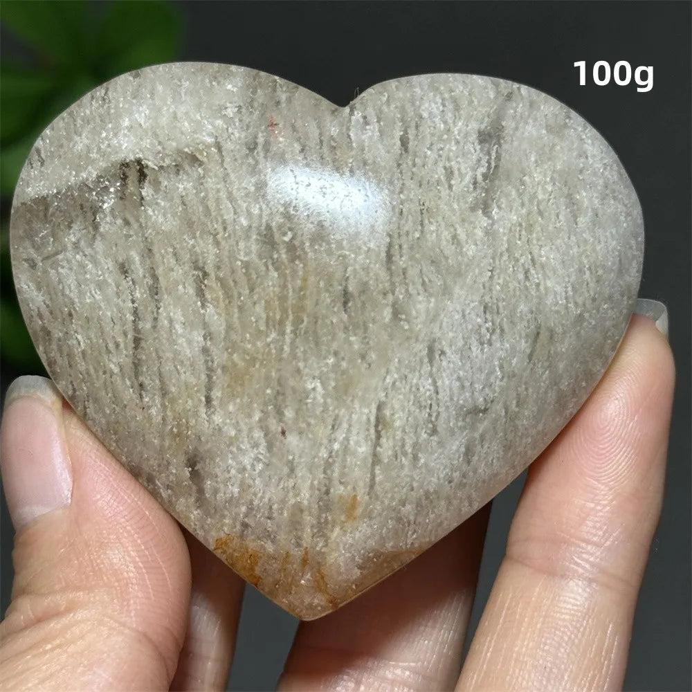100g Natural Garden Thousand-Layer crystal heart ornament, a polished stone for Feng Shui, healing, and meditation.