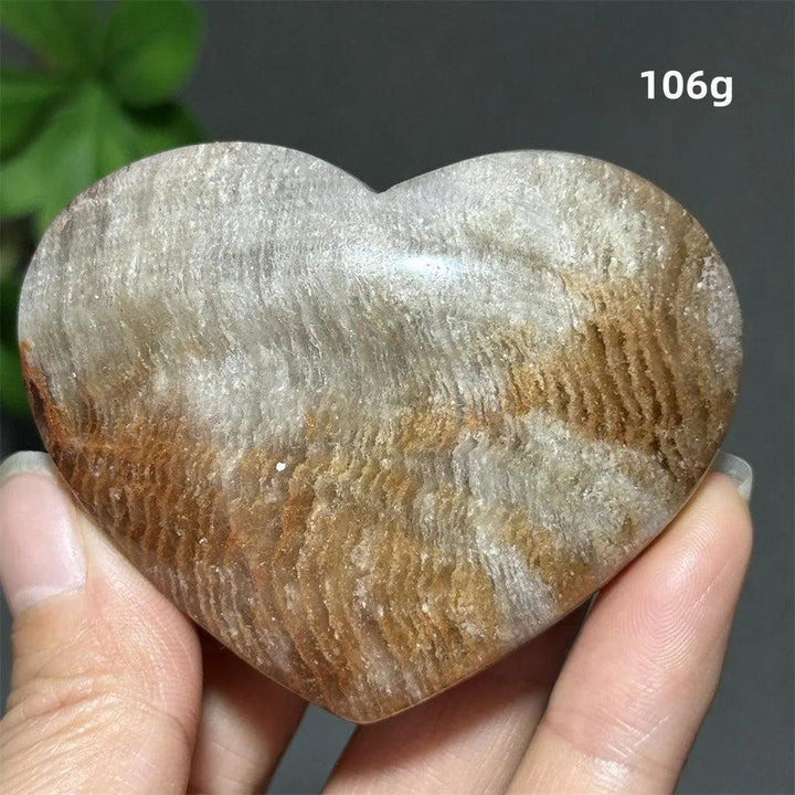106g Natural Garden Thousand-Layer crystal heart ornament with brown and white layers for healing and Feng Shui decor.