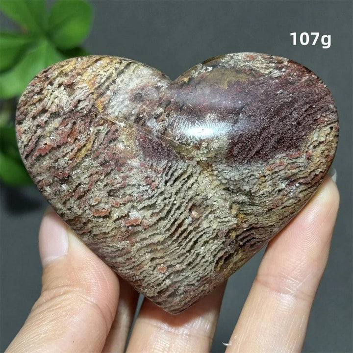 107g heart-shaped Natural Garden Thousand-Layer crystal ornament with earthy red and beige textures for healing energy.