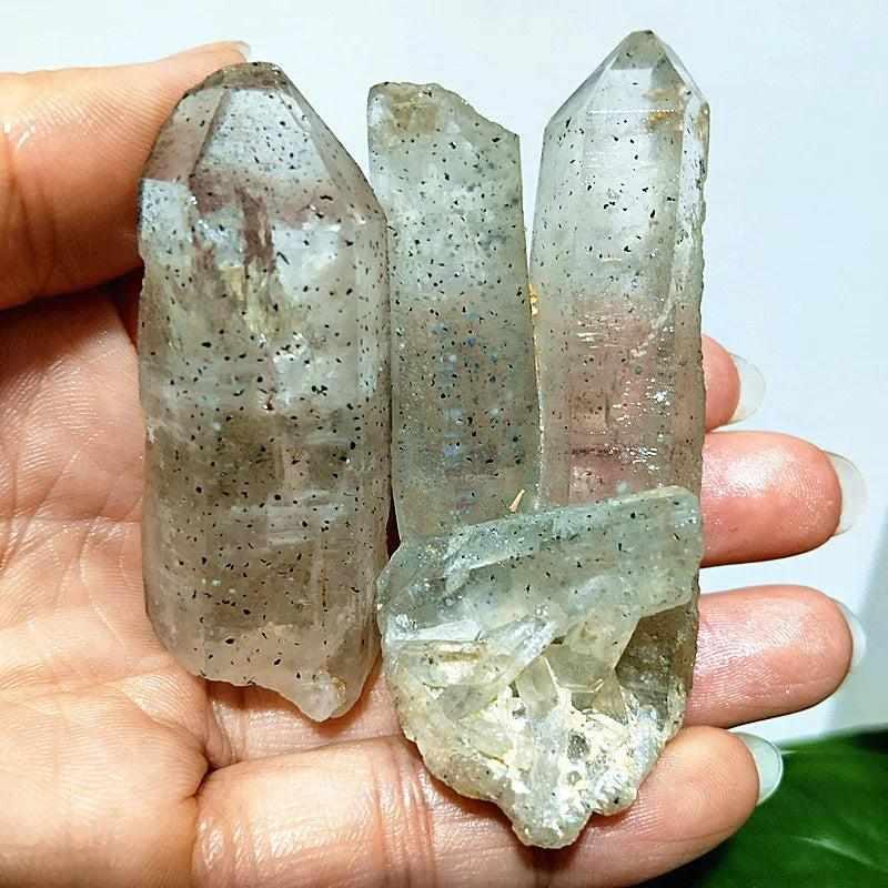 Polished Garden and Strawberry Quartz tower featuring mossy green inclusions and red flecks for heart chakra healing energy.