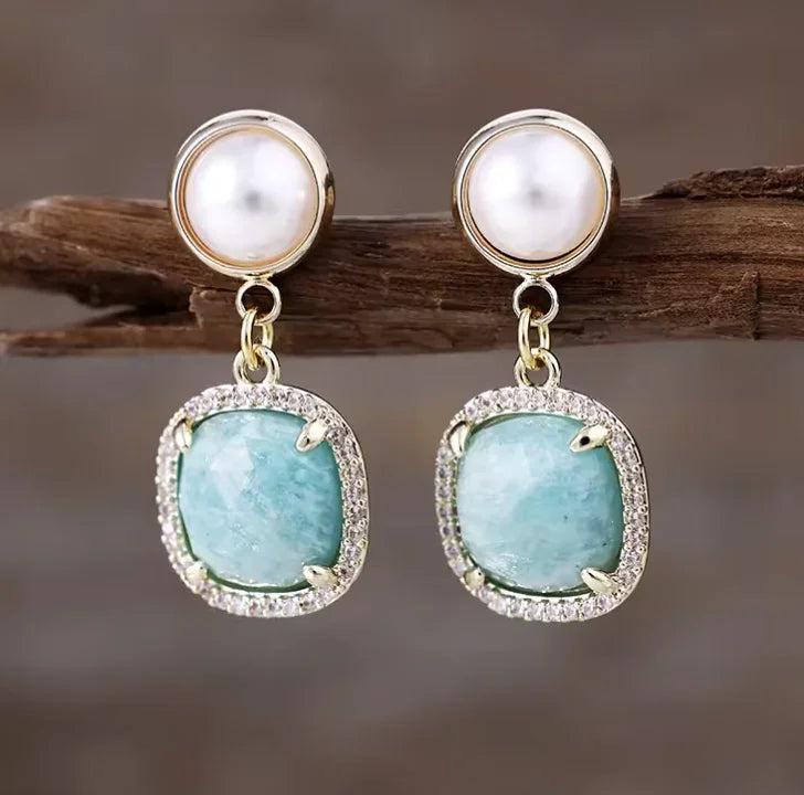 Amazonite gemstone drop earrings with pearl studs, featuring elegant gold settings for calming healing energy.