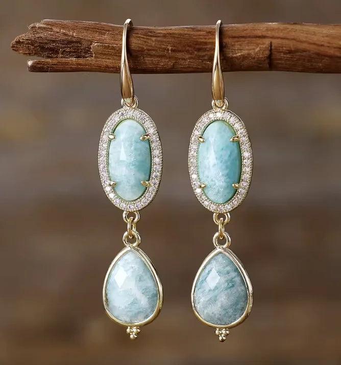 Amazonite gemstone crystal earrings featuring gold-plated drop designs for calming throat chakra energy.
