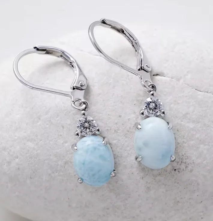 Elegant Larimar gemstone leverback earrings with sparkling accents, perfect for calming energy and sophisticated style.