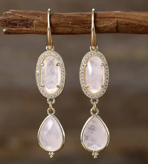 Rose Quartz Gemstone Crystal Earrings featuring elegant gold drop designs for heart-centered healing energy.