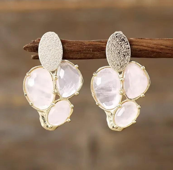 Rose Quartz Gemstone Crystal Earrings featuring soft pink stones in a gold-toned, cluster drop design for heart healing.