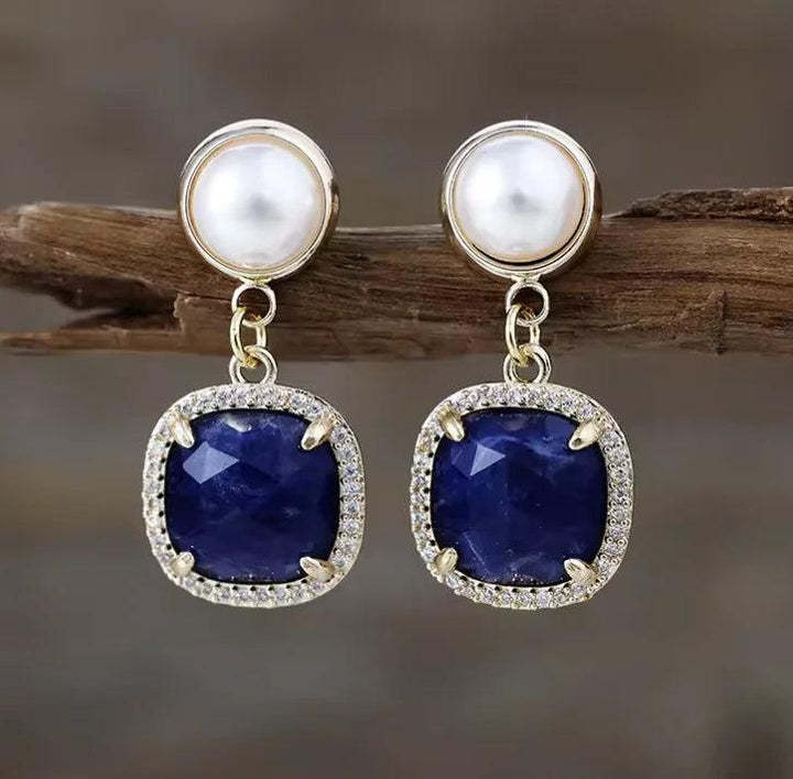 Lapis Lazuli Gemstone Crystal Earrings featuring deep blue square stones, pearl accents, and gold-tone settings.