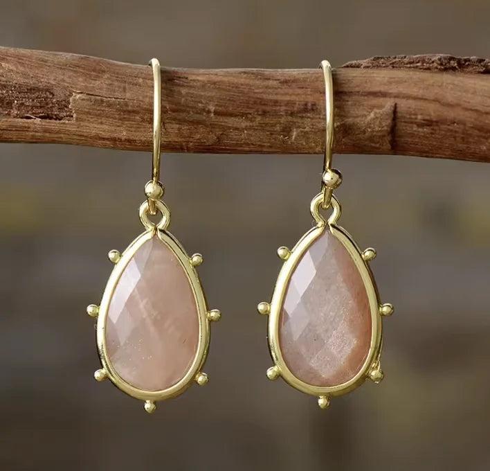 Sunstone teardrop Gemstone Crystal Earrings in gold, featuring faceted healing stones for radiant, warm energy.