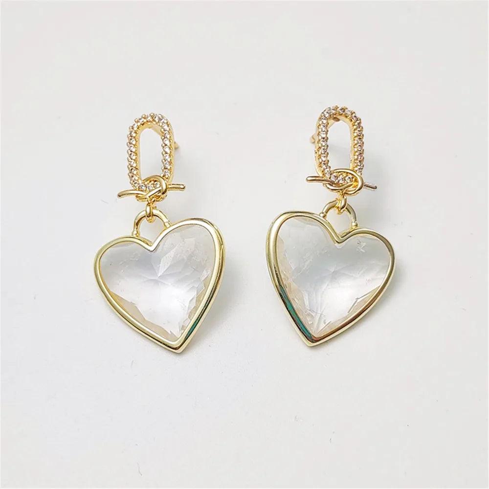 Clear Quartz heart stud earrings in gold-plated copper, featuring a sparkling pavé link for elegant, heart-centered energy.