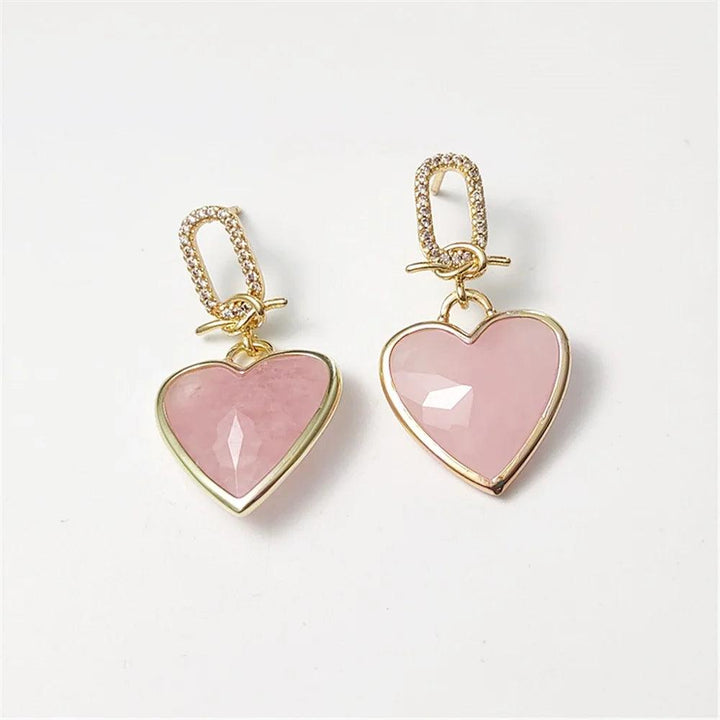 Rose Quartz heart stud earrings in gold-plated copper, perfect for Heart Chakra energy and everyday elegance.