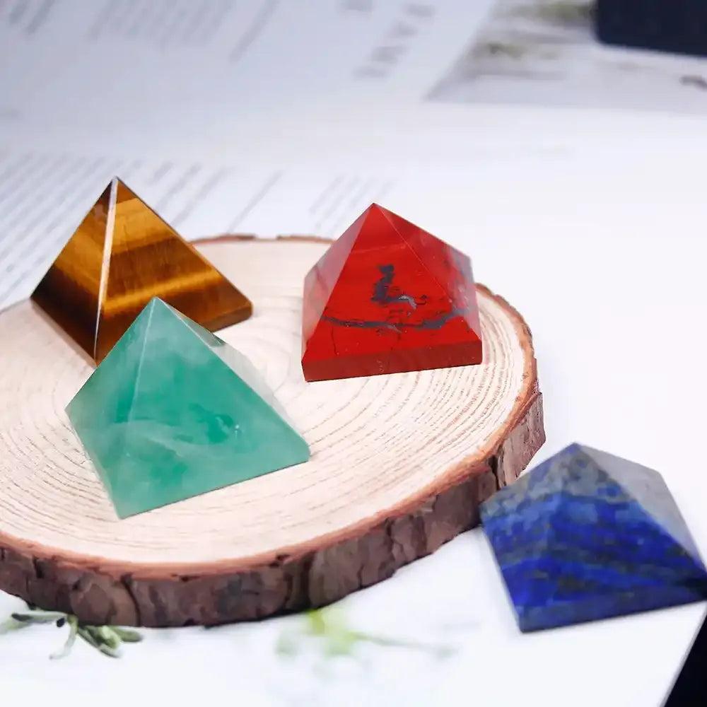 Polished Gemstone Mini Pyramids in tiger eye, red jasper, green fluorite, and lapis lazuli for focused healing energy.