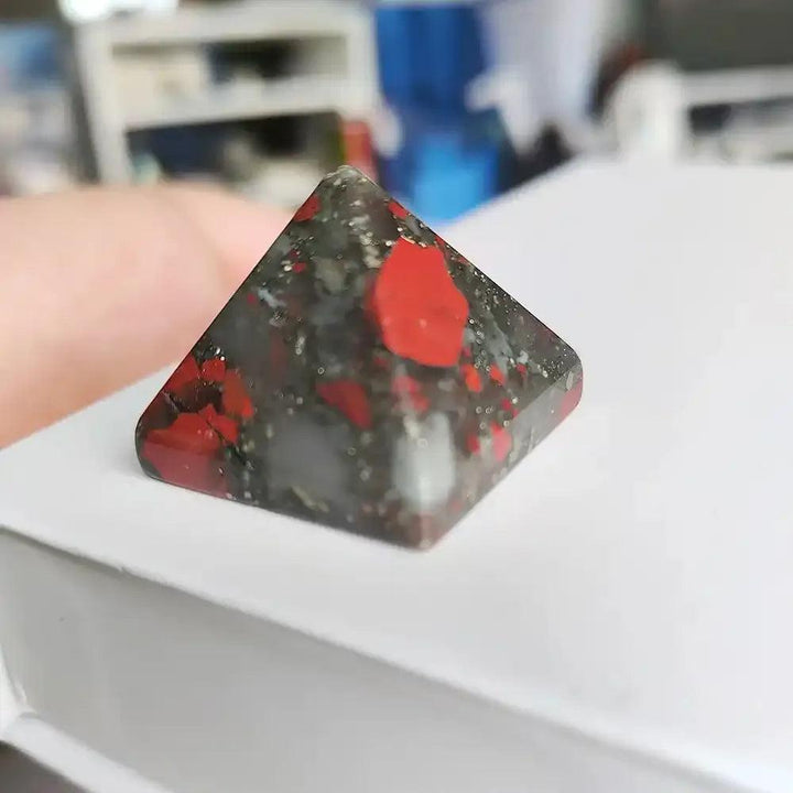 Polished Bloodstone Gemstone Mini Pyramid, a 30mm sacred geometry crystal for grounding and intention setting.