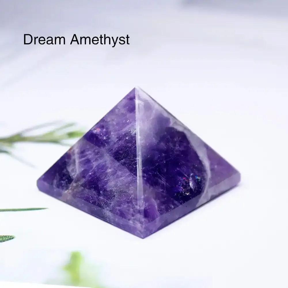 Polished Dream Amethyst mini pyramid, a 30mm sacred geometry crystal for spiritual focus and chakra balancing.