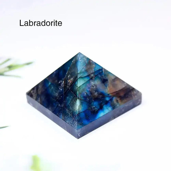 Polished 30mm Labradorite gemstone mini pyramid with iridescent blue flashes for focused intention and energy healing.