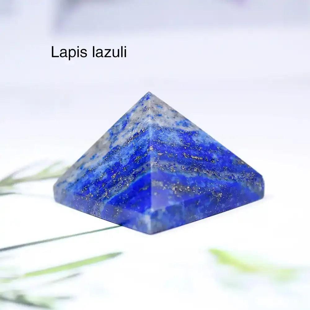Polished Lapis Lazuli mini gemstone pyramid, a 30mm sacred geometry crystal for focus and chakra balancing.