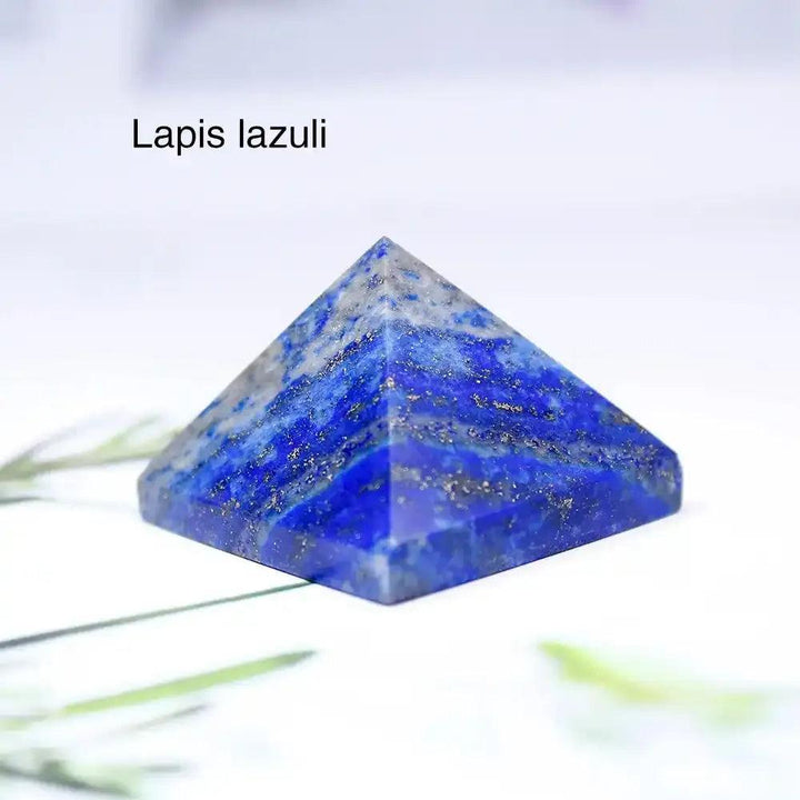 Polished Lapis Lazuli mini gemstone pyramid, a 30mm sacred geometry crystal for focus and chakra balancing.