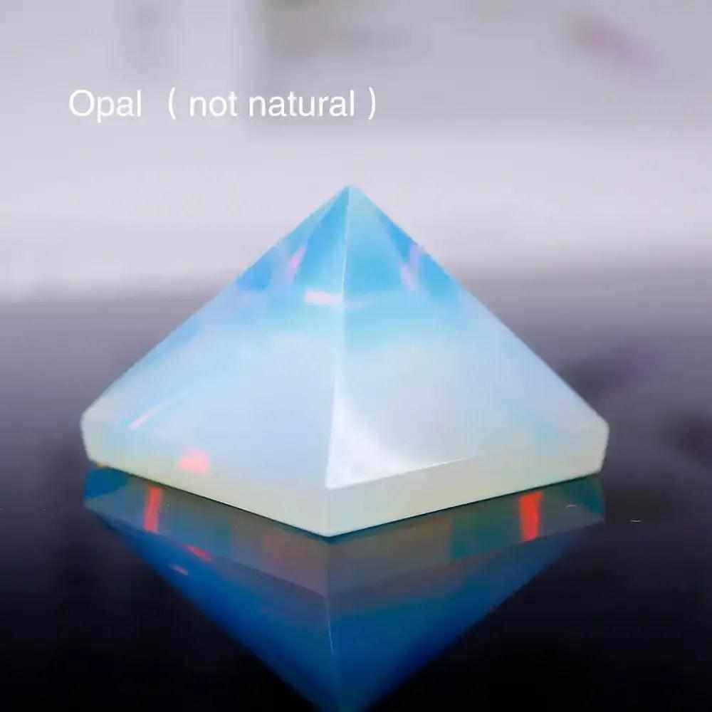 Polished opalite mini gemstone pyramid with a glowing blue hue, perfect for focusing intention and energy healing.