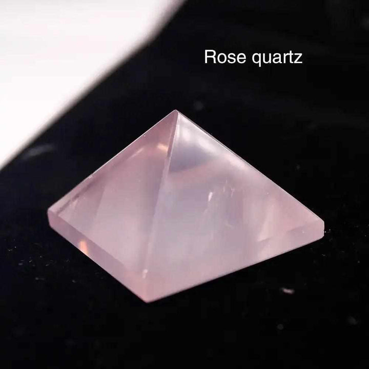 Polished rose quartz mini pyramid, a 30mm sacred geometry crystal for heart chakra healing and love energy.