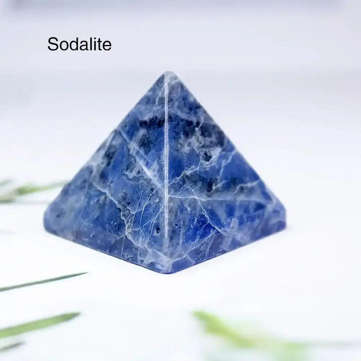 Polished blue sodalite gemstone mini pyramid, a 30mm sacred geometry crystal for focused intention and healing.