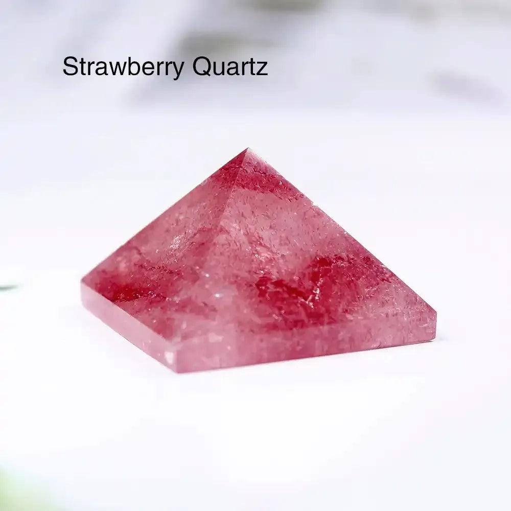 Polished Strawberry Quartz mini gemstone pyramid, a 30mm sacred geometry crystal for focused intention and healing.