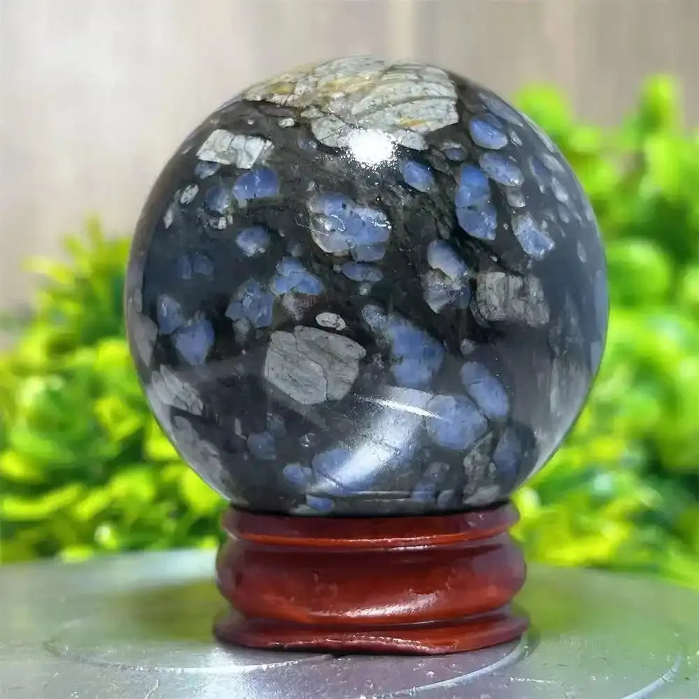 Polished Glaucophane Que Sera crystal sphere with blue and grey mineral patterns, perfect for Reiki healing and home decor.