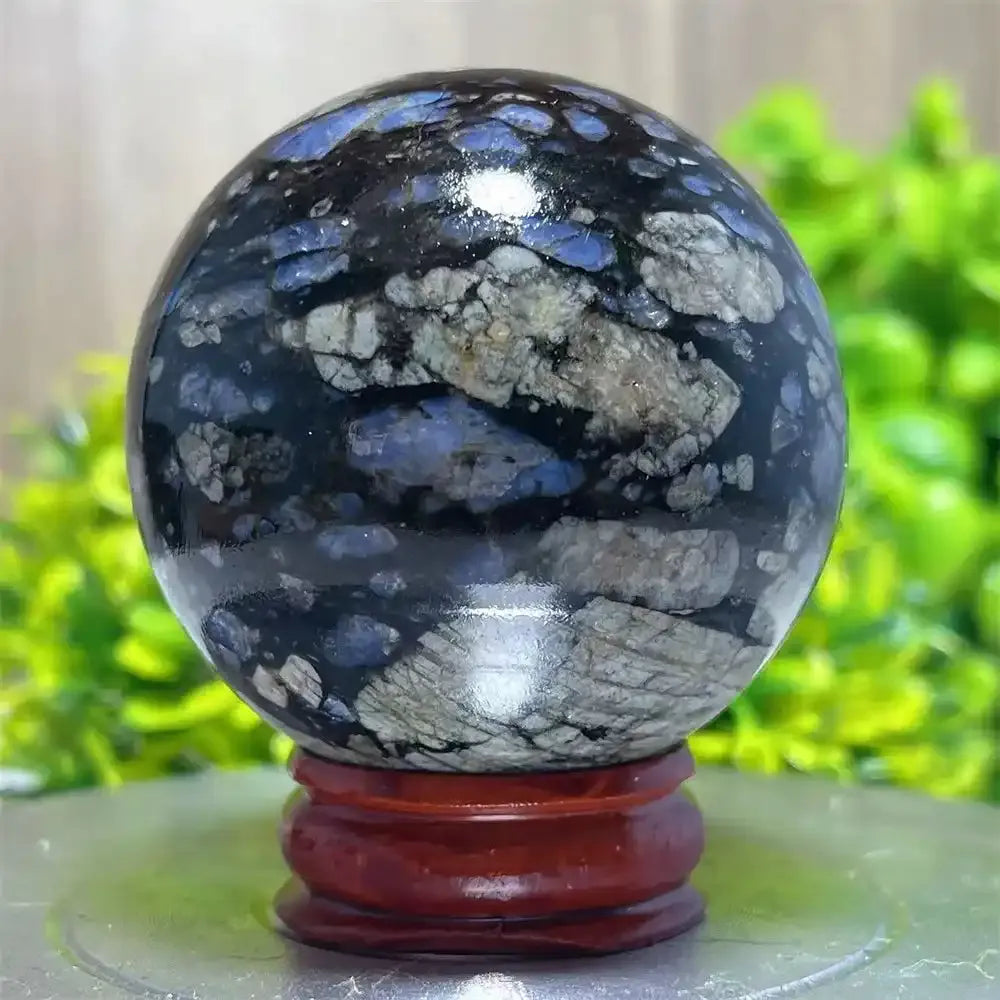 Polished Glaucophane sphere with blue and grey mineral patterns, perfect for Reiki healing and spiritual home decor.