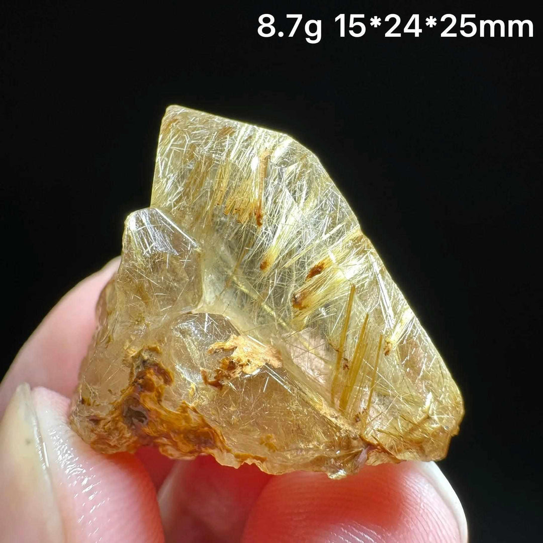 Gold rutilated quartz and specular hematite specimen featuring golden needles and metallic sheen for chakra healing.