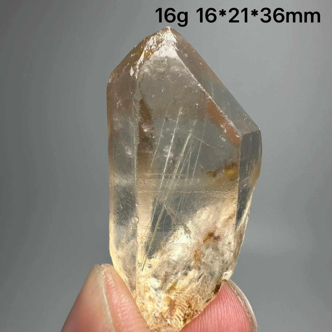 Gold rutilated quartz and specular hematite specimen with golden needles, 16g, 16x21x36mm, for solar plexus and root chakras.