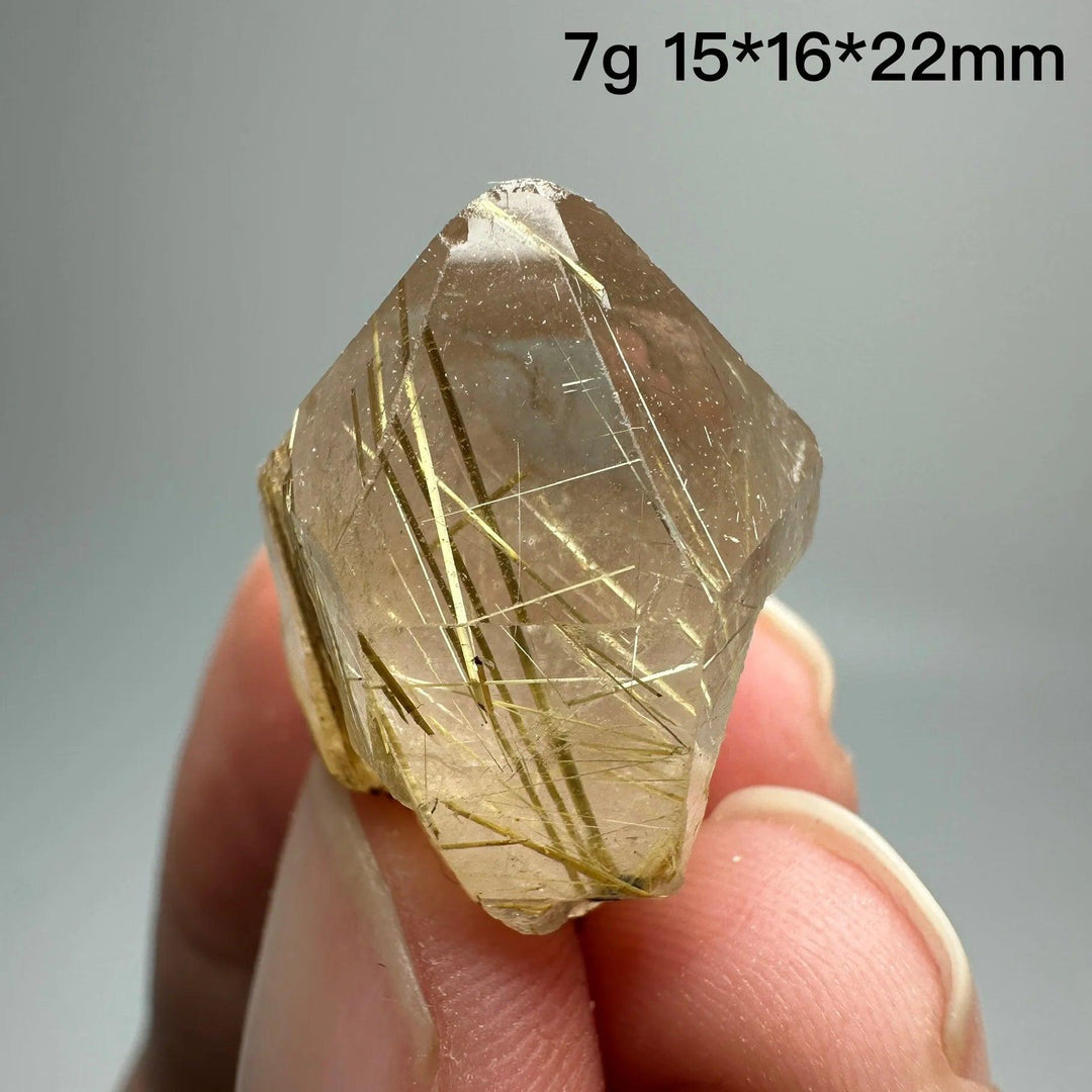 Natural Brazil Gold Rutilated Quartz crystal, 7g, 15*16*22mm, with golden hair-like inclusions.