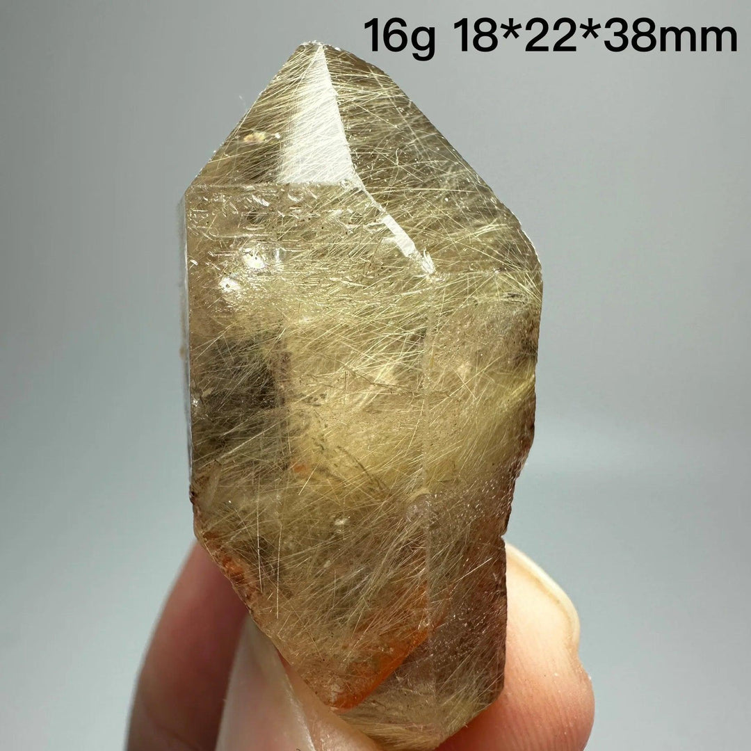 Natural Brazil Gold Rutilated Quartz crystal specimen, 16g, 18x22x38mm, with hair-like inclusions.
