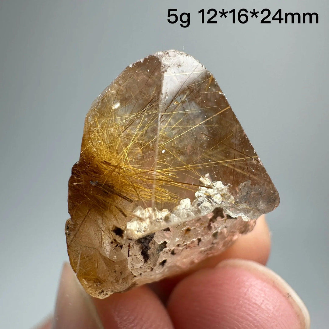 Natural Brazil Gold Rutilated Quartz crystal with golden hair-like inclusions and specular hematite, 5g, 12*16*24mm.
