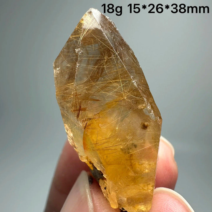 Natural Brazil Gold Rutilated Quartz crystal specimen, 18g, with golden rutile needles and specular hematite.