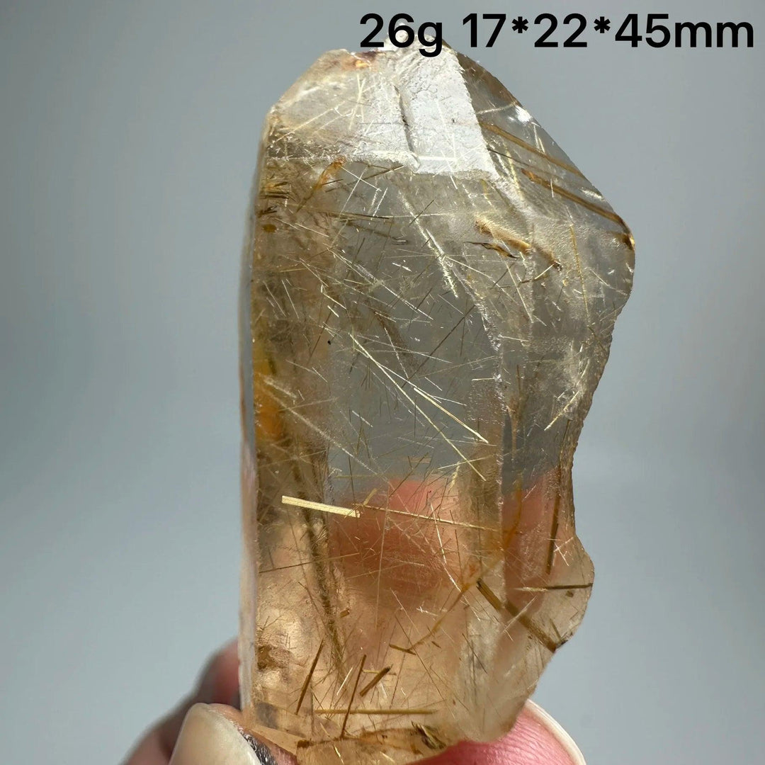 Natural Brazil Gold Rutilated Quartz crystal specimen, 26g, 17x22x45mm, with golden rutile needles.