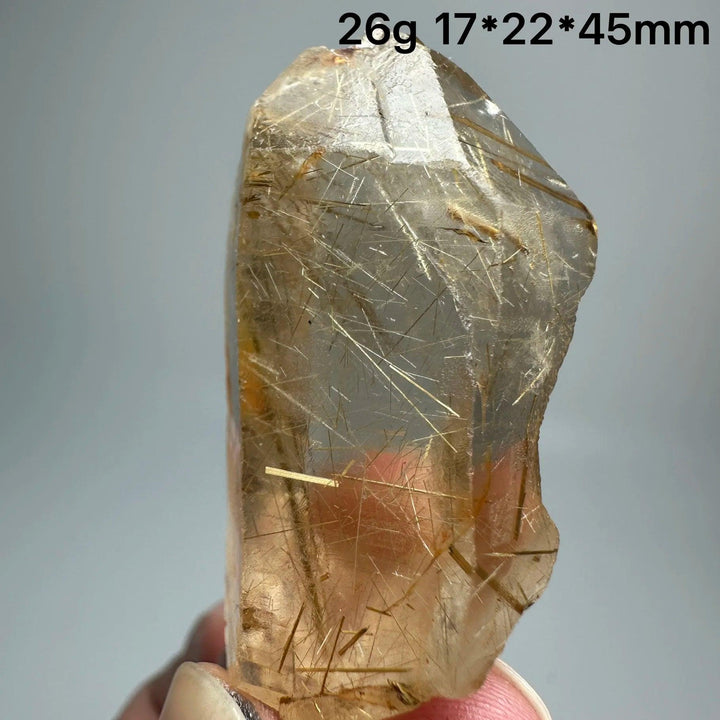Natural Brazil Gold Rutilated Quartz crystal specimen, 26g, 17x22x45mm, with golden rutile needles.