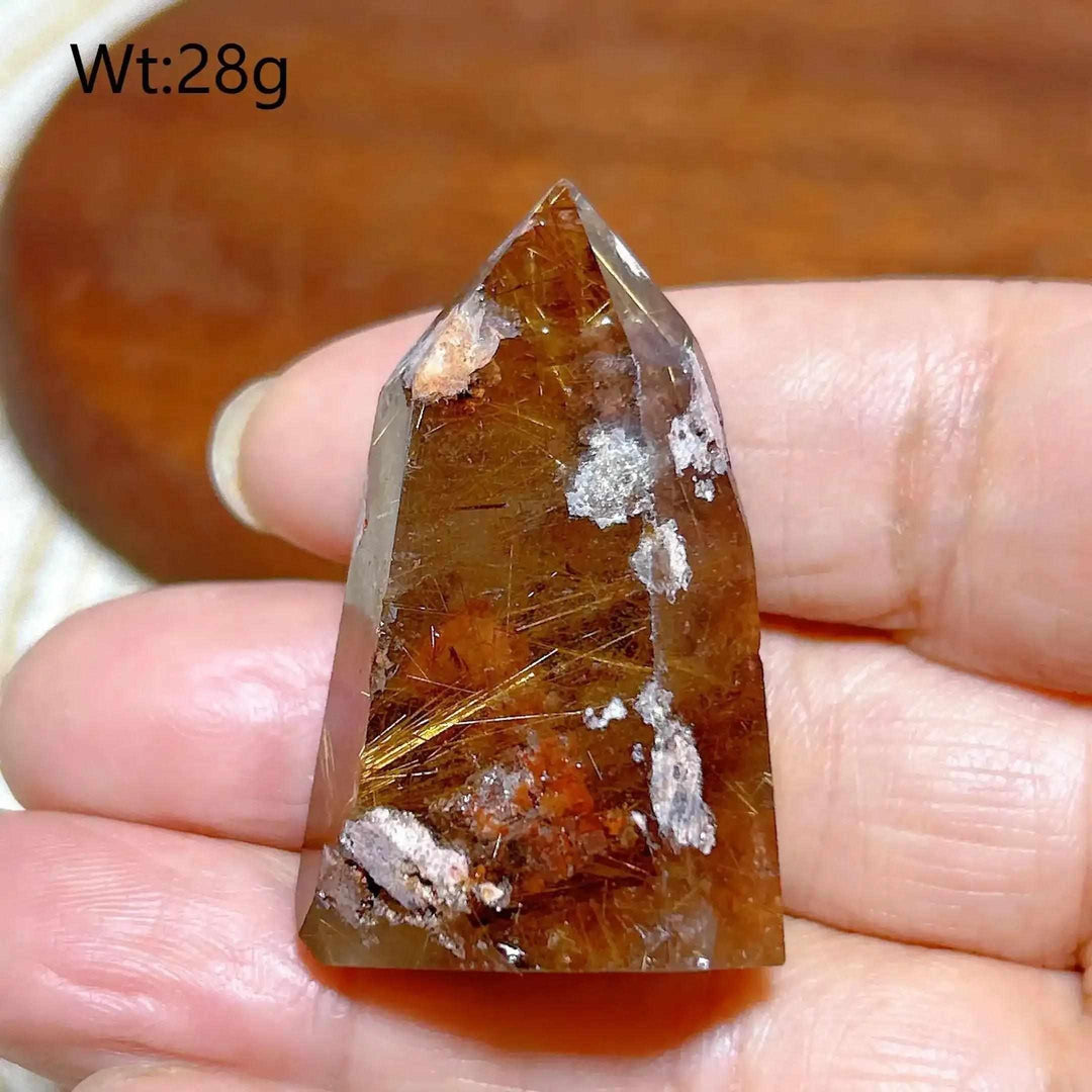 Hand-polished Golden Rutilated Quartz tower with golden needles, perfect for meditation and Solar Plexus chakra energy.