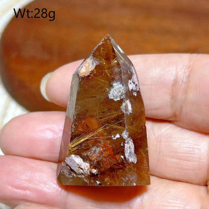 Hand-polished Golden Rutilated Quartz tower with golden needles, perfect for meditation and Solar Plexus chakra energy.