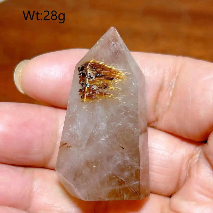 Hand-polished Golden Rutilated Quartz tower with fine golden needles, perfect for focus and energy amplification.