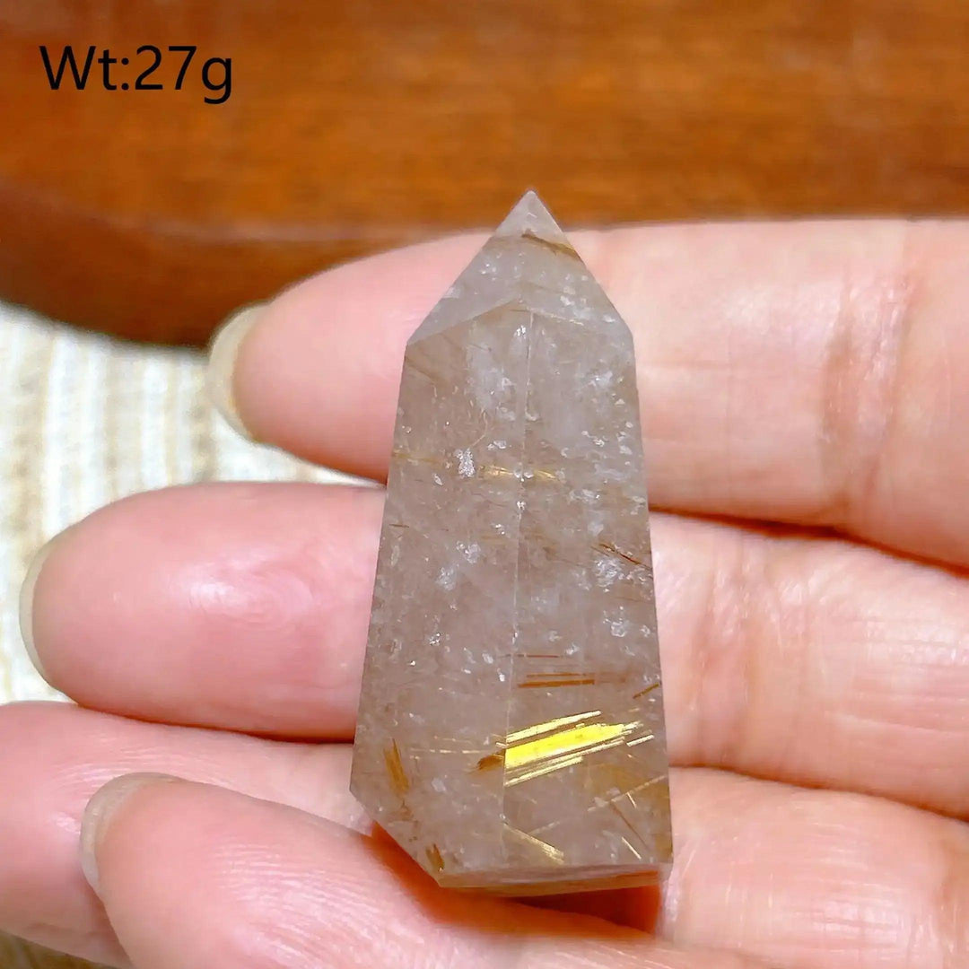 Hand-polished Golden Rutilated Quartz tower with fine golden needles, perfect for focus and energy amplification.
