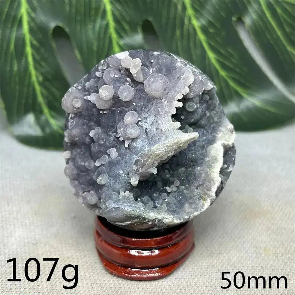 Indonesian Grape Agate Crystal Sphere: Lilac, lavender, and deep purple botryoidal formations on a smooth orb, 107g, 50mm.