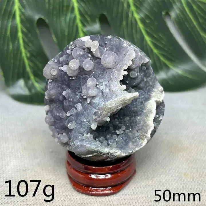 Indonesian Grape Agate Crystal Sphere: Lilac, lavender, and deep purple botryoidal formations on a smooth orb, 107g, 50mm.