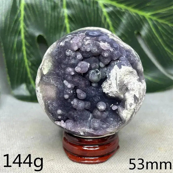 Indonesian Grape Agate Crystal Sphere: Lilac, lavender, deep purple botryoidal formations, 144g, 53mm, on a wooden stand.