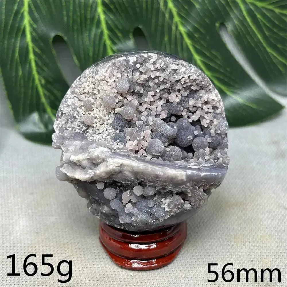 Indonesian Grape Agate Crystal Sphere, 56mm, 165g. Polished orb with shimmering lilac, lavender, deep purple botryoidal formations. Soothing energy.