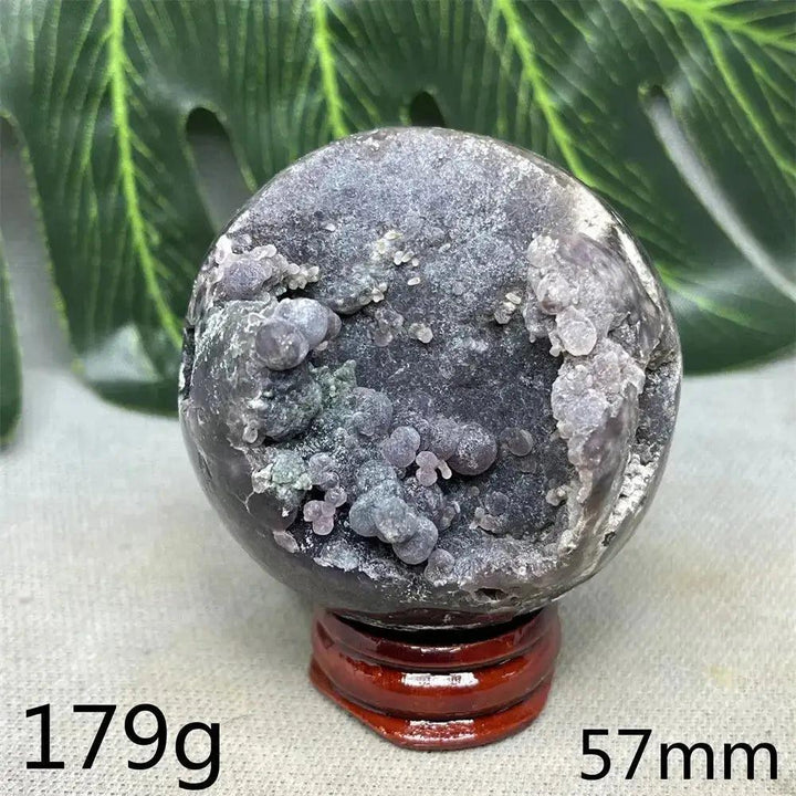 Indonesian Grape Agate Crystal Sphere, 57mm, 179g. Polished orb with shimmering lilac, lavender, deep purple botryoidal formations. Soothing energy.