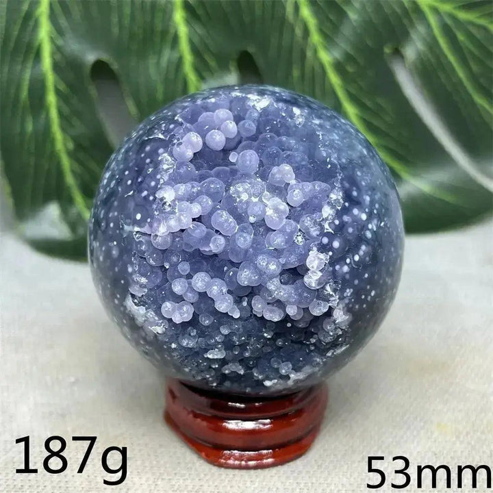 Indonesian Grape Agate Crystal Sphere: Lilac, lavender, deep purple botryoidal formations, smooth orb, soothing energy.