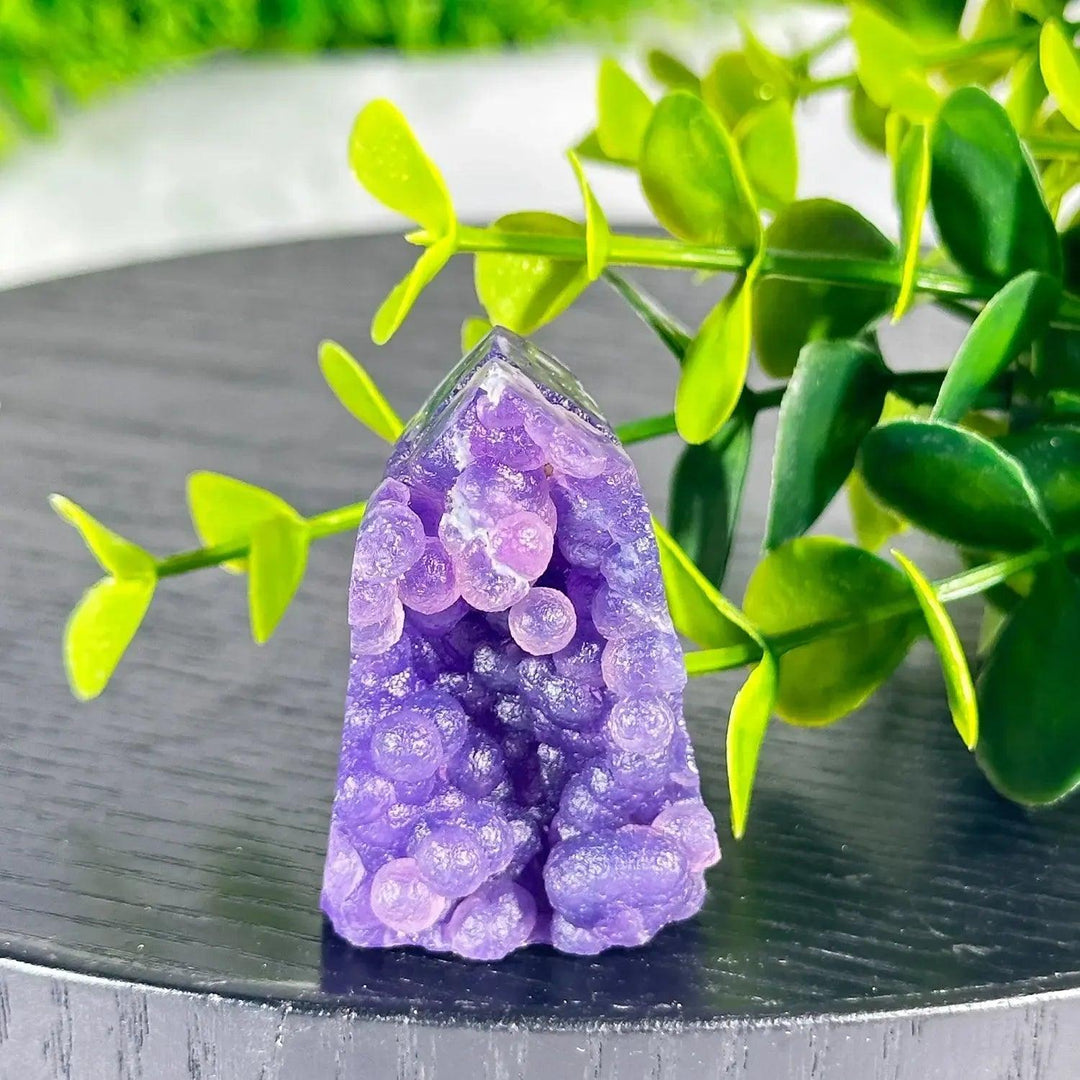 Grape Agate Tower: Deep purple botryoidal chalcedony, a stone of calm confidence and inner vision.