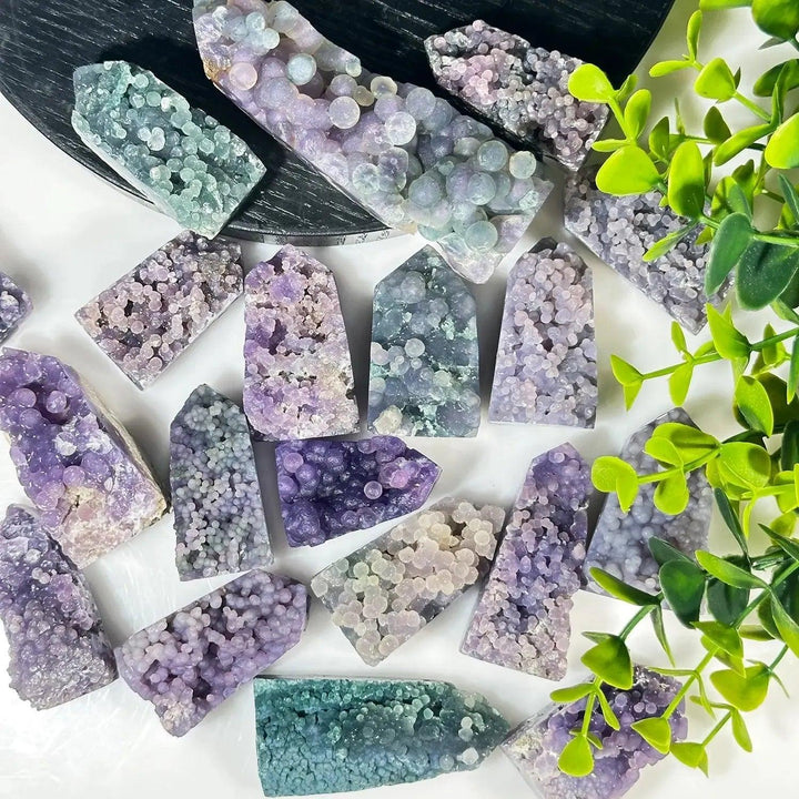 Grape Agate Tower from Crystal Destiny, featuring mesmerizing purple and lavender botryoidal formations for clarity and balance.