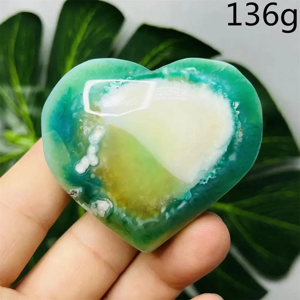 Green Agate Crystal Heart: Hand-carved heart with natural green banding, translucent beauty, and nurturing energy.