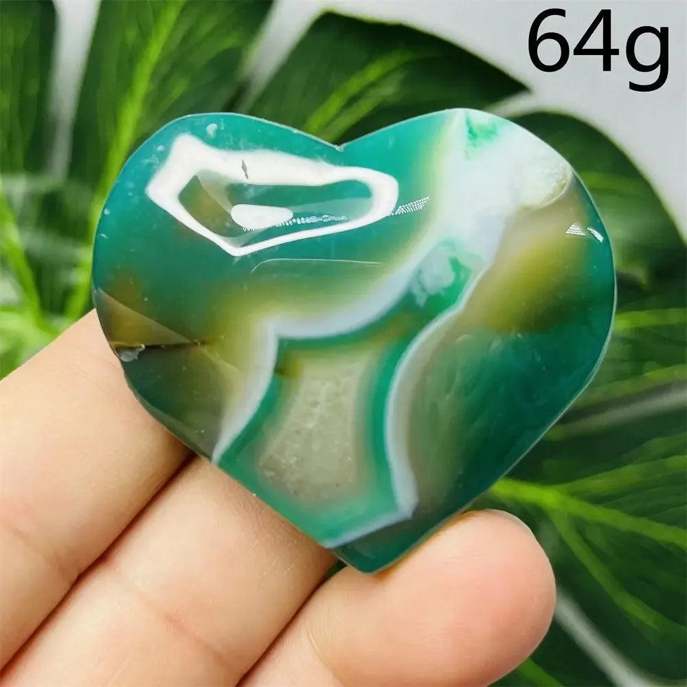 Hand-carved Green Agate Crystal Heart, 64g, with natural green banding and translucent beauty, promoting emotional balance.
